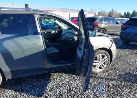 2018 Chevrolet Equinox Premier z USA, uszkodzony, nr VIN 3GNAXWEX4JS520423